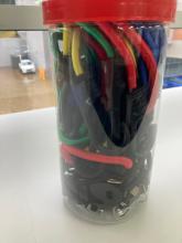 Photograph of bungee cords in a jar