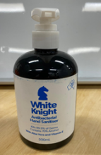 Photograph of White Knight Clear Brown Bottle